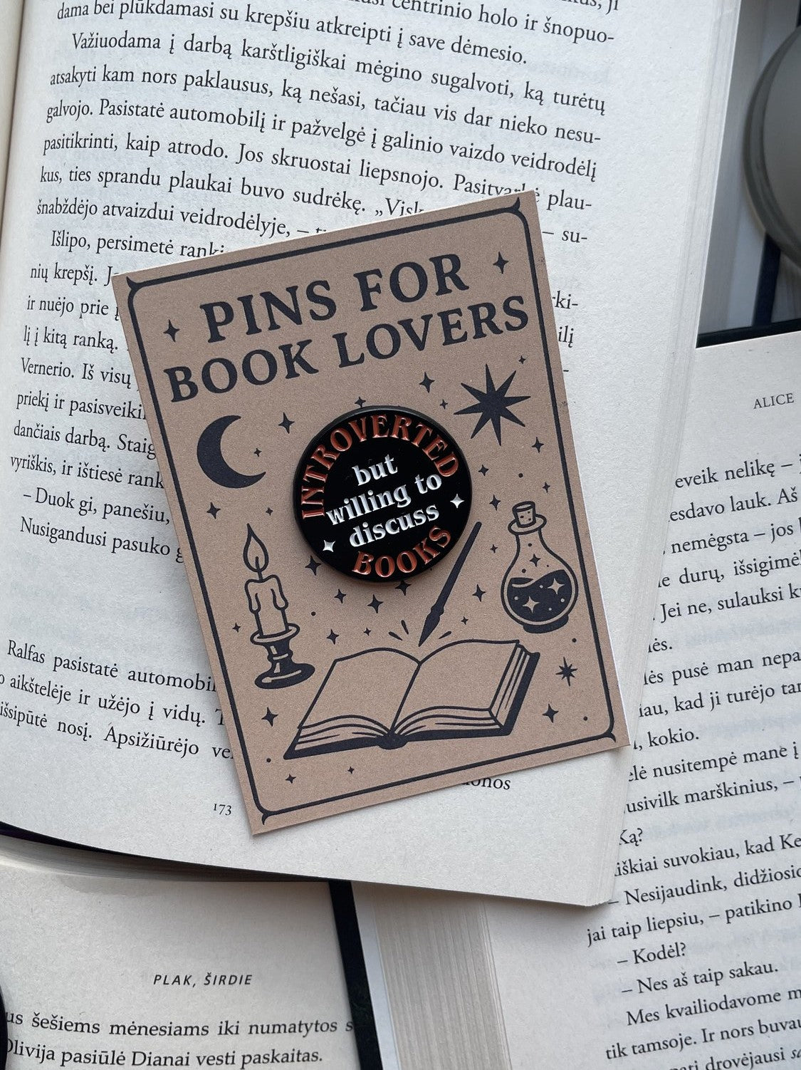 Pins "INTROVERTED, but willing to discuss BOOKS"
