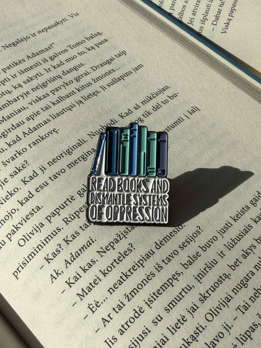 Pins "Read books and dismantle systems of oppression"