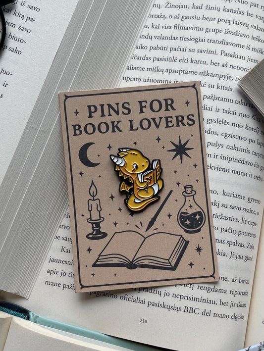 Pins "Dragon reading Fourth Wing"